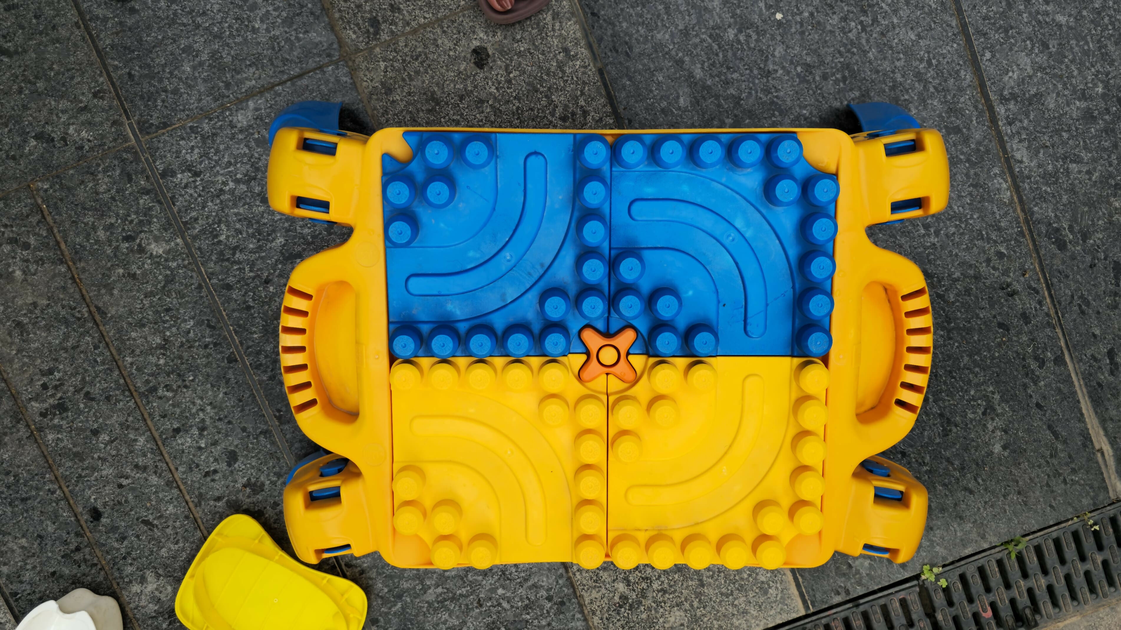 The Sand with Blocks Table is an engaging and multi-functional play station that combines creative sand play with fun building block activities.