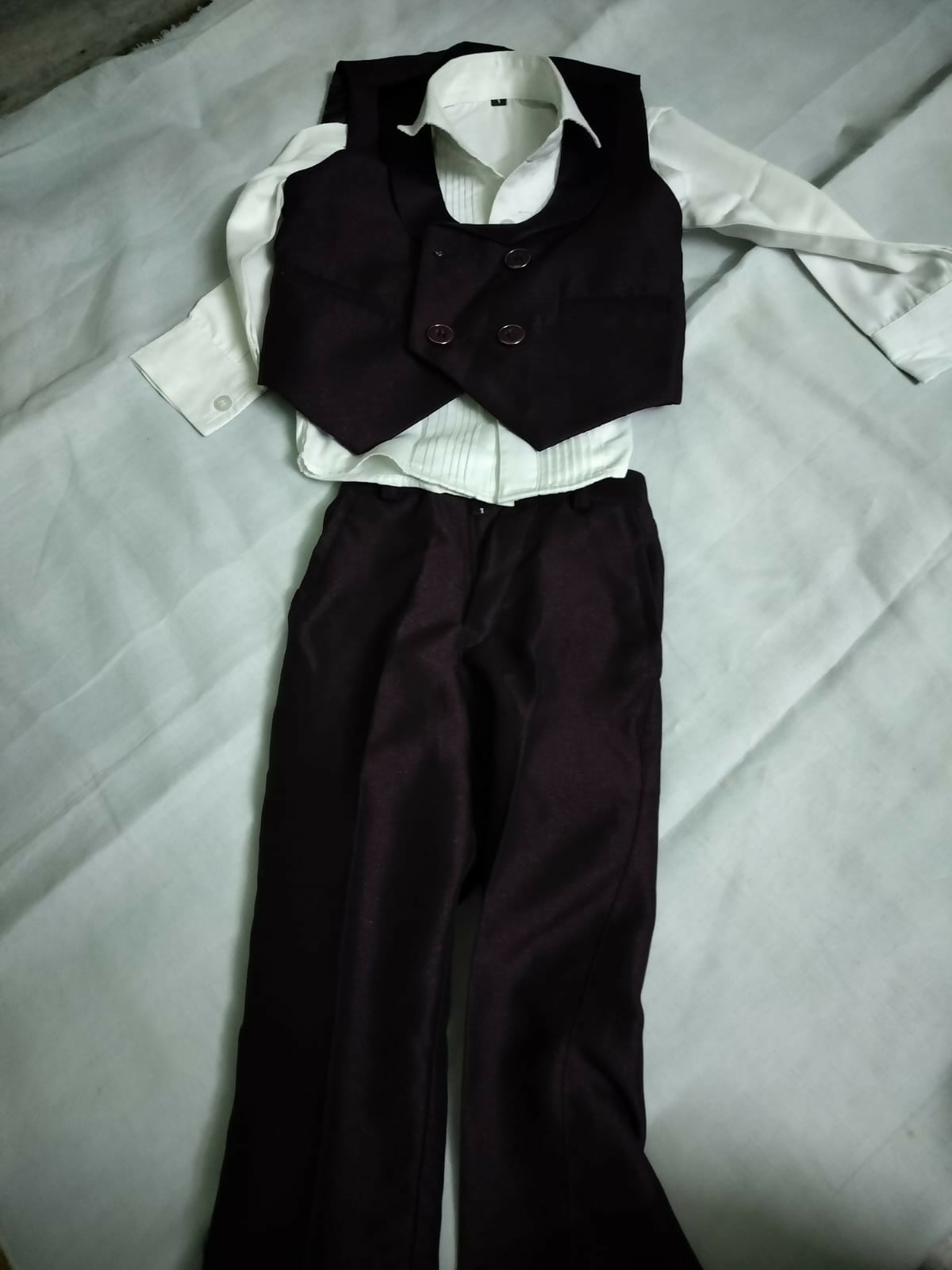 Dress your little gentleman in style with our Baby Boy Tuxedo, offering charm and sophistication for special occasions.