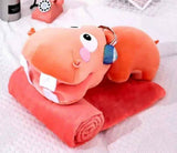 Plush toy elephant with a blanket