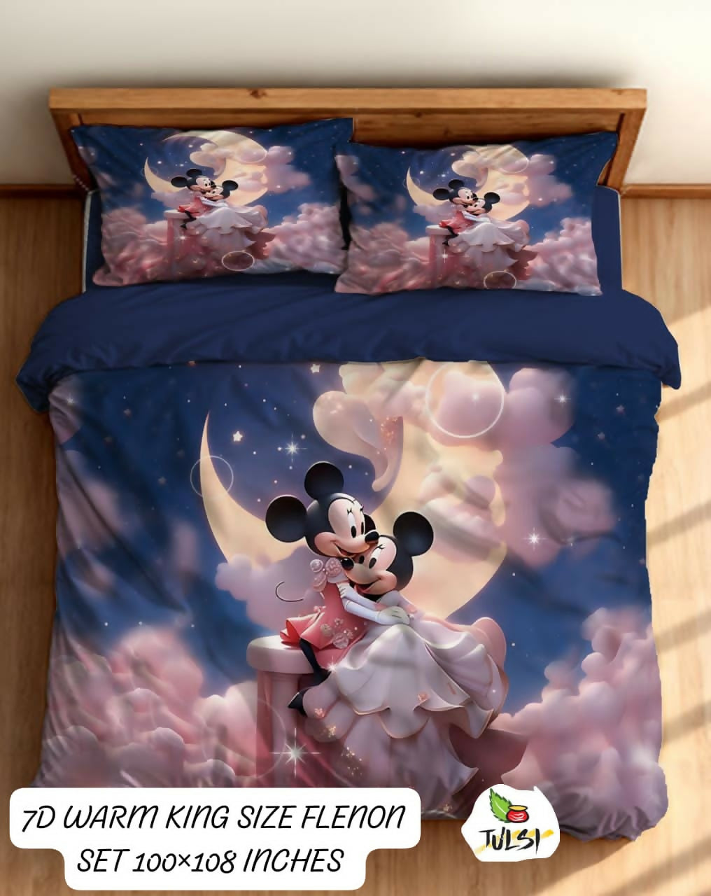 Mickey and Minnie Mouse bedding set on a bed with a moon and cloud design.