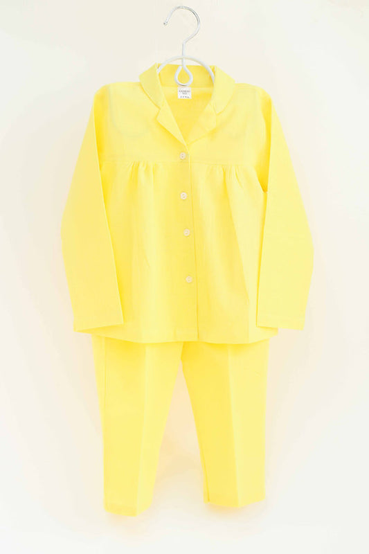 Shop bright yellow 100% cotton nightwear for girls, offering softness and comfort for a restful night's sleep.