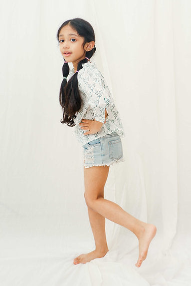 Discover the beautiful handmade 100% cotton smoke top for girls, featuring soft, breathable fabric and elegant smocking, perfect for casual and special occasions.