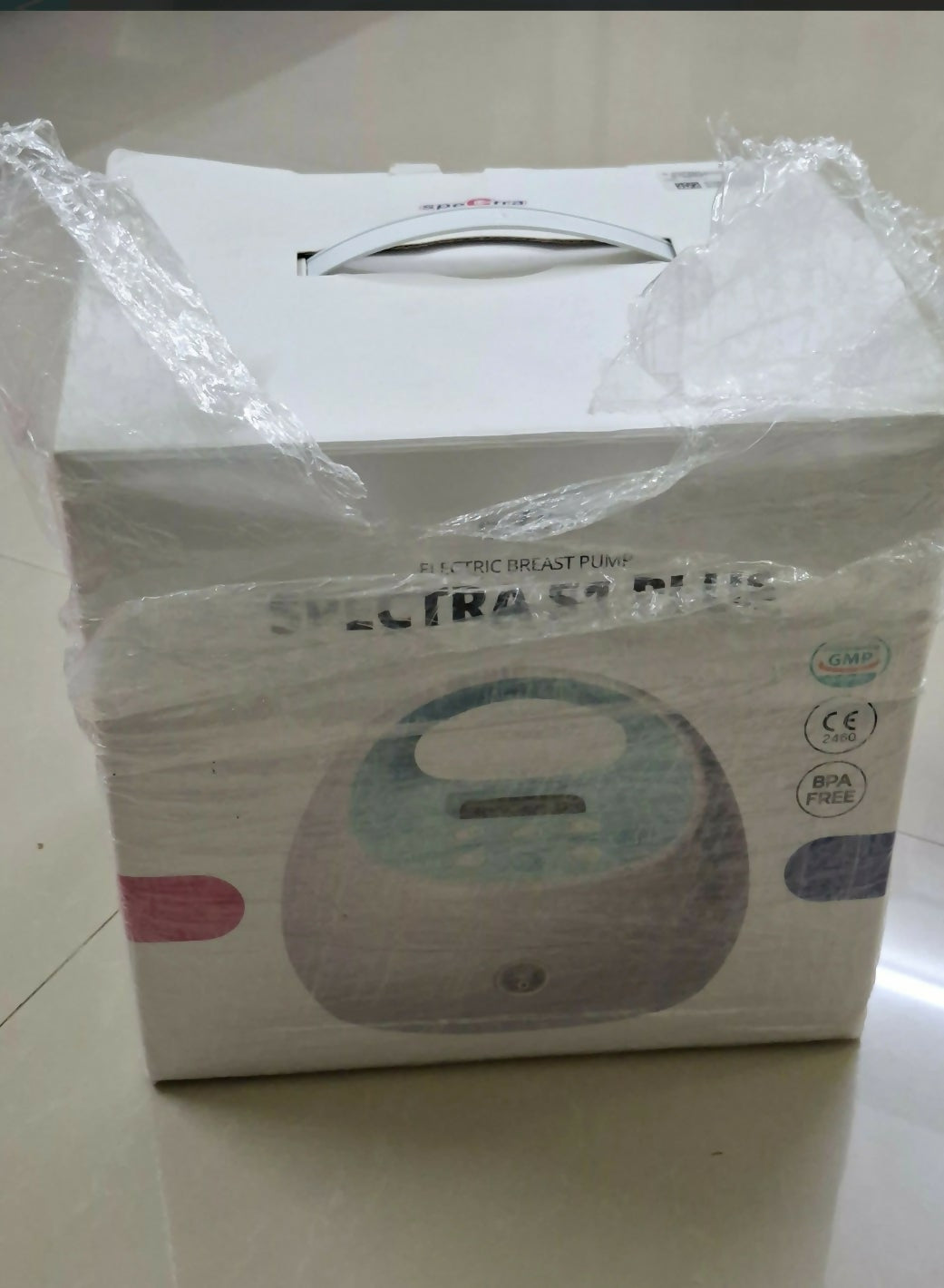Spectra S2 Plus breast pump in packaging on a white surface