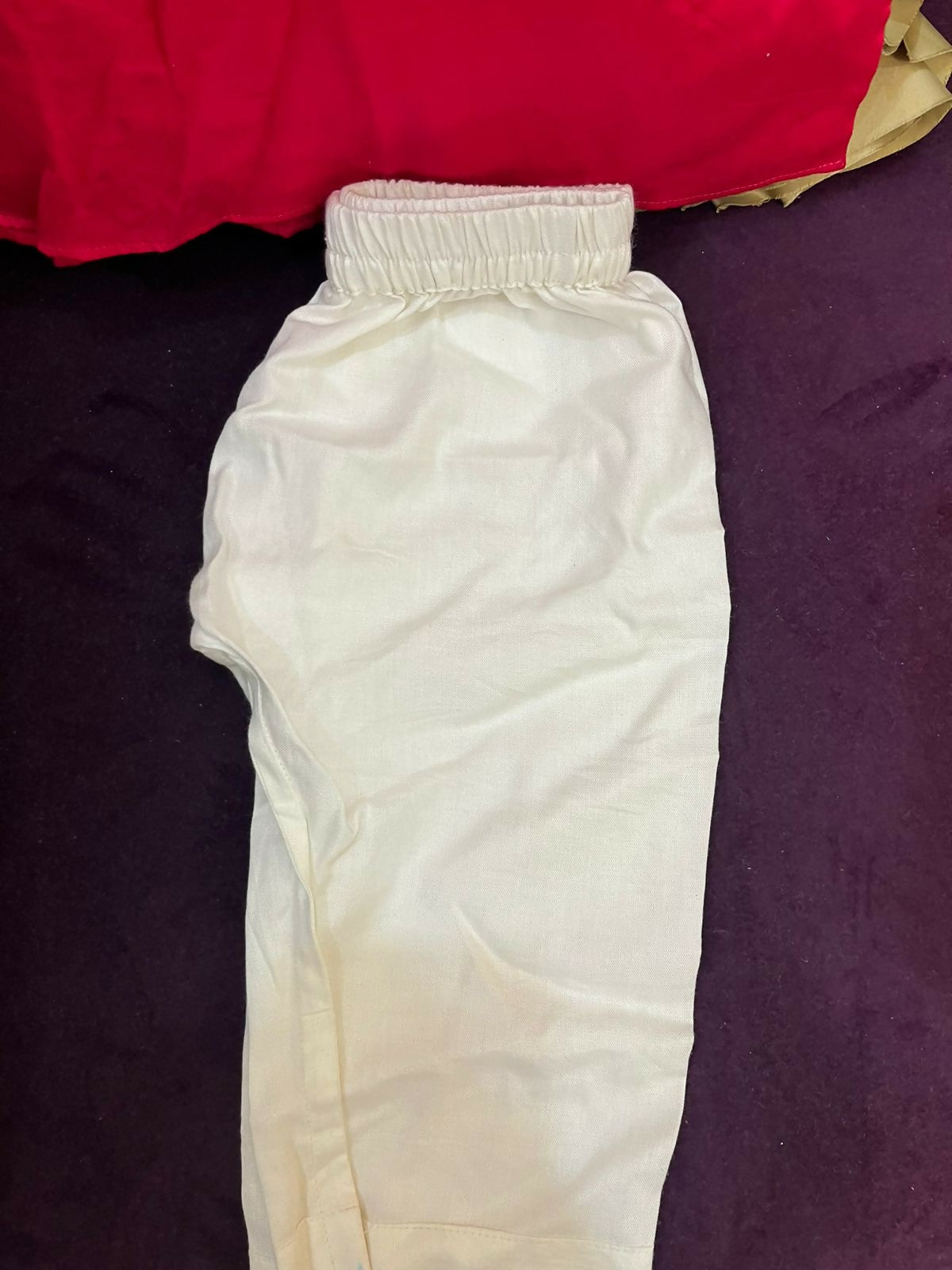 Pure georgette lehenga set for baby girls with handwork butti and matching accessories, plus a stylish baby boy kurta-pyjama set for festive elegance.