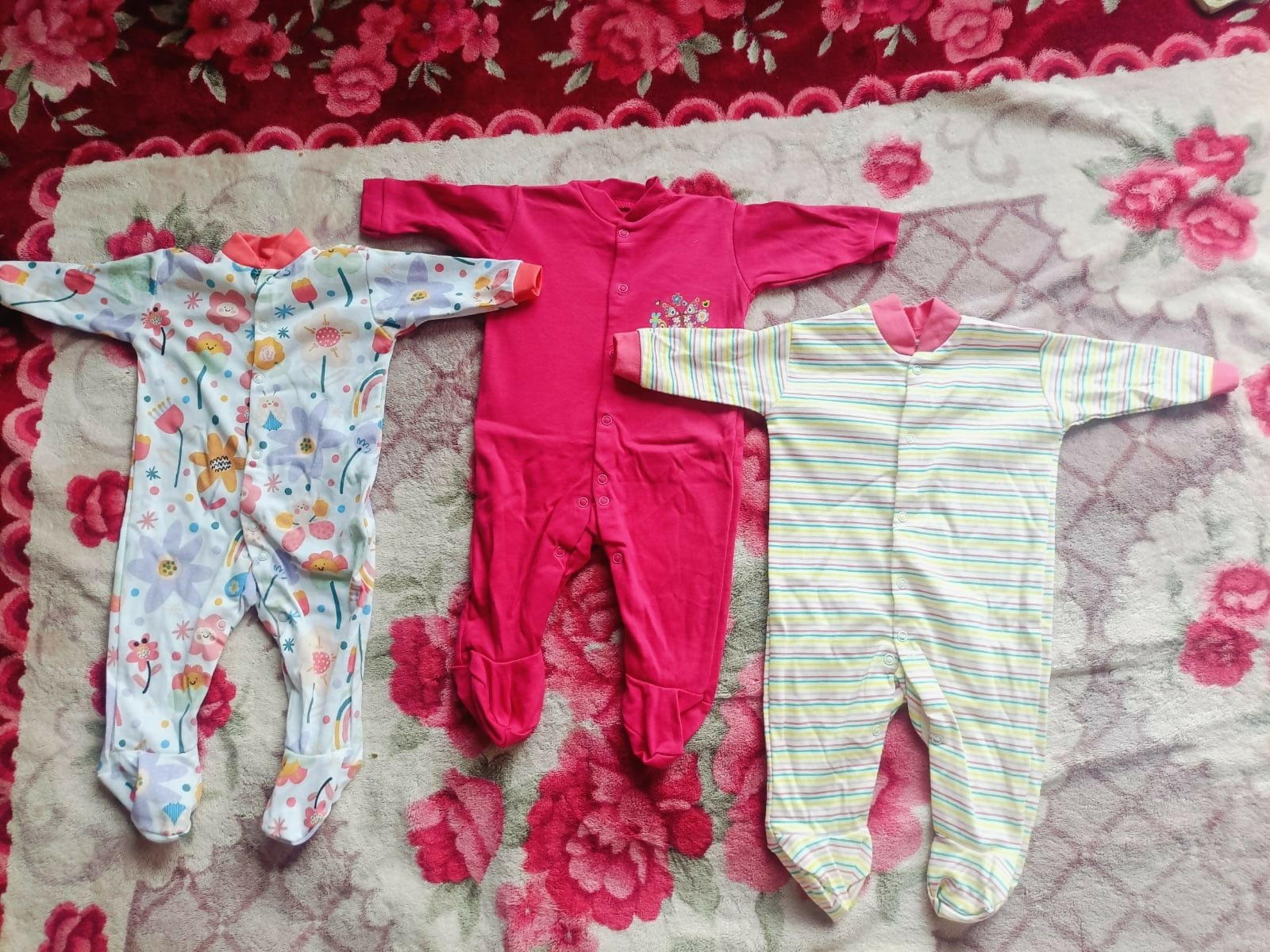 Set of 3 baby rompers in pink and multicolor prints, soft fabric, almost new condition