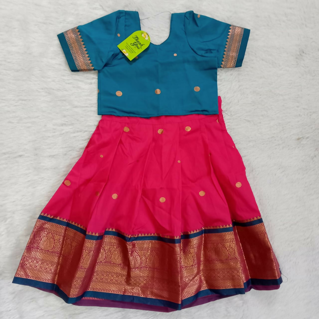 Discover our Half Saree for Baby Girls, crafted with delicate fabrics and vibrant colors for a charming and unique look perfect for special occasions.