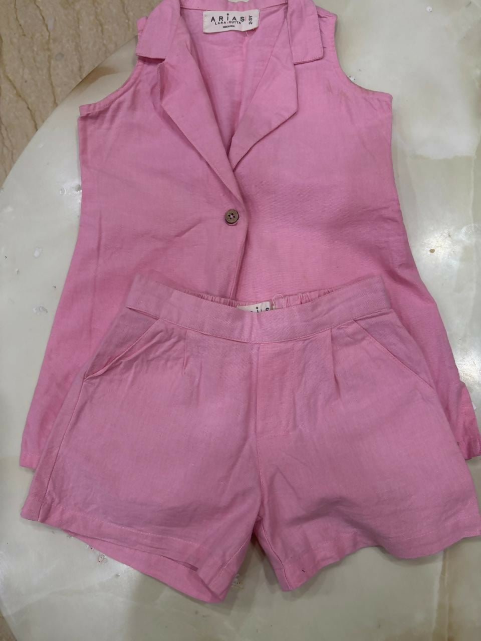 ARIAS BY LARA DUTTA linen shorts with sleeveless jacket set featuring breathable fabric, stylish coordinated design, comfortable fit, and chic casual wear for girls.