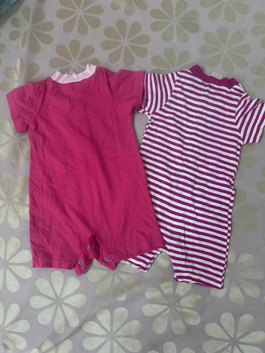 Set of 2 Rompers for baby girls, featuring soft, breathable fabric and easy snap closures for comfort and convenience.