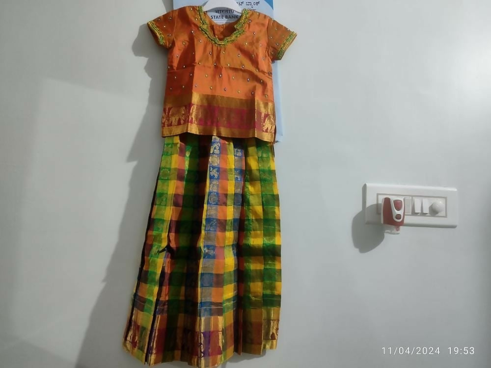 Dress your little girl in luxury and elegance with our Silk Lehenga and Blouse set, perfect for special occasions and celebrations.