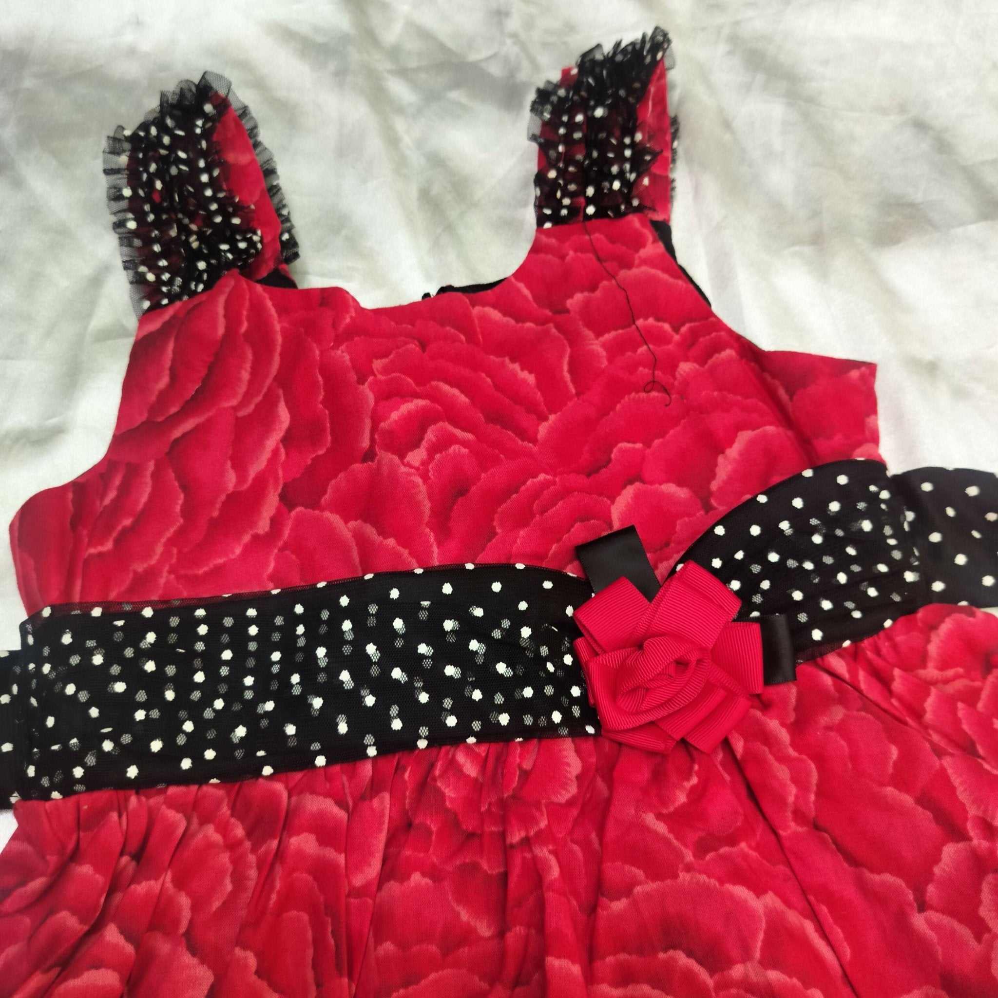 Red cute dress for girls with soft fabric, comfortable fit, stylish design, and charming look for casual wear, parties, or special occasions.