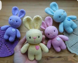 Handcrafted crochet bunny made from soft yarn with intricate stitching, adorable floppy ears, and a cuddly design, perfect for babies, kids, gifting, and nursery décor.