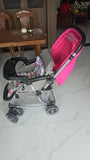 BABYHUG 2 in 1 Rock and Roll stroller cum rocker with reclining seat, sturdy wheels, safety harness, canopy, and dual stroller-to-rocker design for baby comfort and travel.