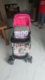 BABYHUG 2 in 1 Rock and Roll stroller cum rocker with reclining seat, sturdy wheels, safety harness, canopy, and dual stroller-to-rocker design for baby comfort and travel.
