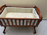 BABYHUG cradle with BABYHUG mattress and bumpers featuring cozy sleeping space, cushioned mattress, protective side bumpers, sturdy frame, and comfortable support for baby sleep.