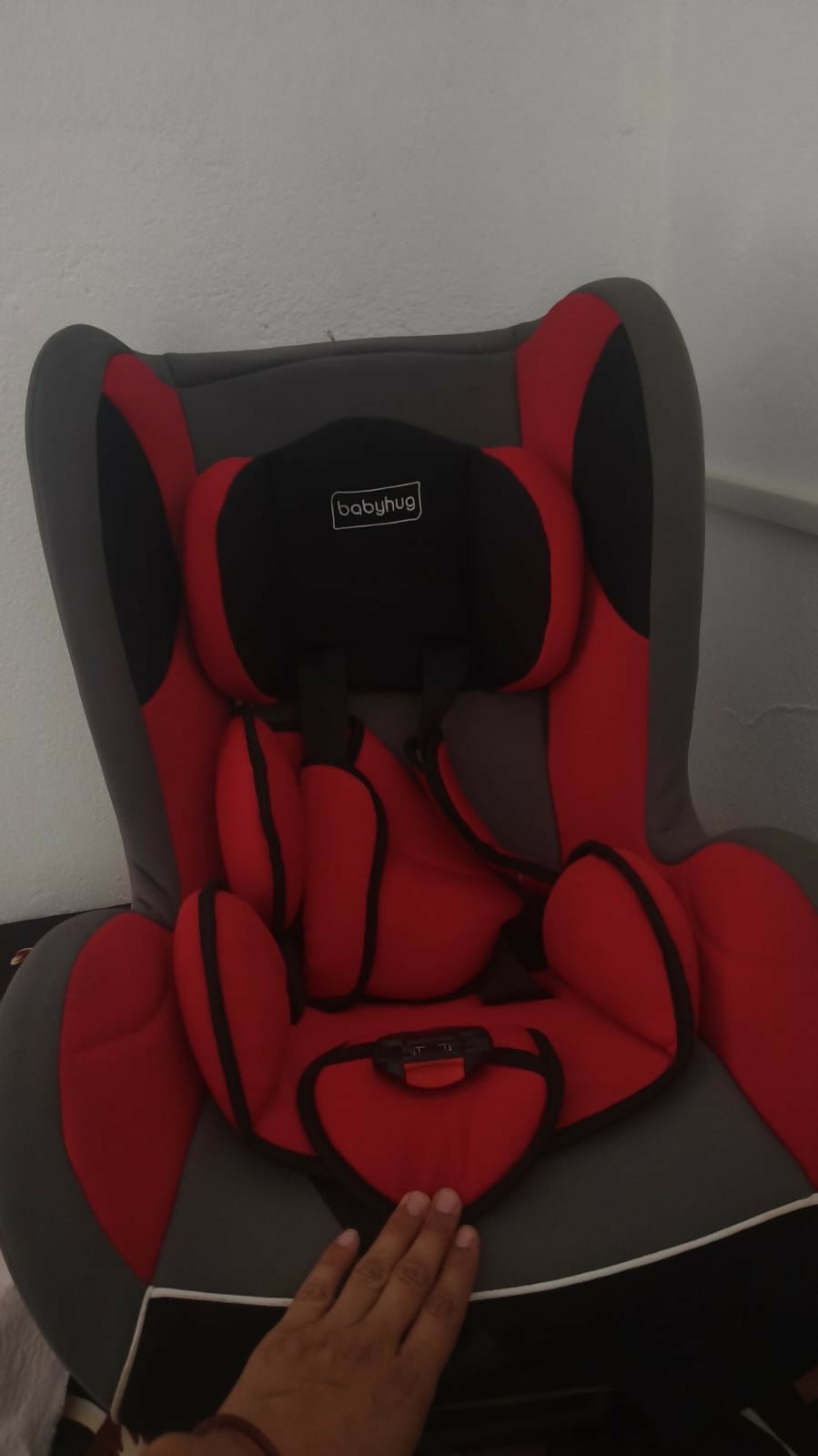 BABYHUG Cruise convertible car seat with rear and forward-facing modes, adjustable safety harness, cushioned seating, side-impact protection, and comfortable support for growing children.