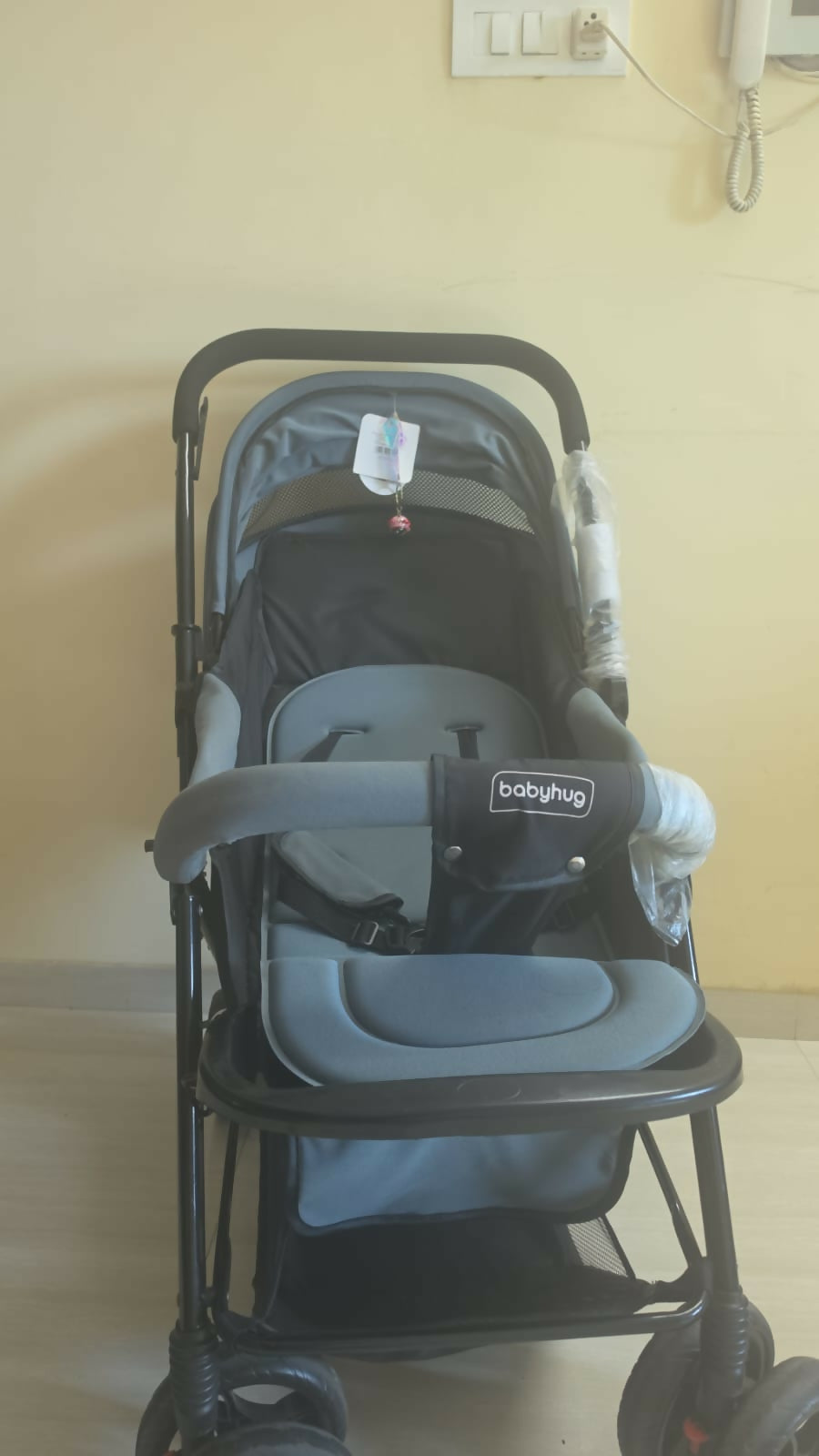 BABYHUG Symphony stroller with reversible handle, reclining seat, safety harness, adjustable canopy, smooth wheels, and comfortable travel support for babies and toddlers.