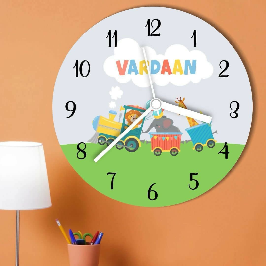 Children's wall clock with cartoon train design