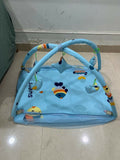 Baby bed with hanging toys featuring a soft cushioned asleeping area, protective sides, and colorful hanging toys to keep babies comfortable, engaged, and entertained.