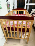 BABYHUG Hamilton wooden cot/crib with sturdy wooden construction, spacious storage drawer, comfortable mattress, protective side rails, and a durable design for newborns and growing babies.