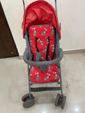 POLKA TOTS baby stroller with 5-point safety harness, adjustable canopy, storage basket, lightweight umbrella-fold design, and smooth wheels for babies and toddlers up to 20 kg (0–5 years).