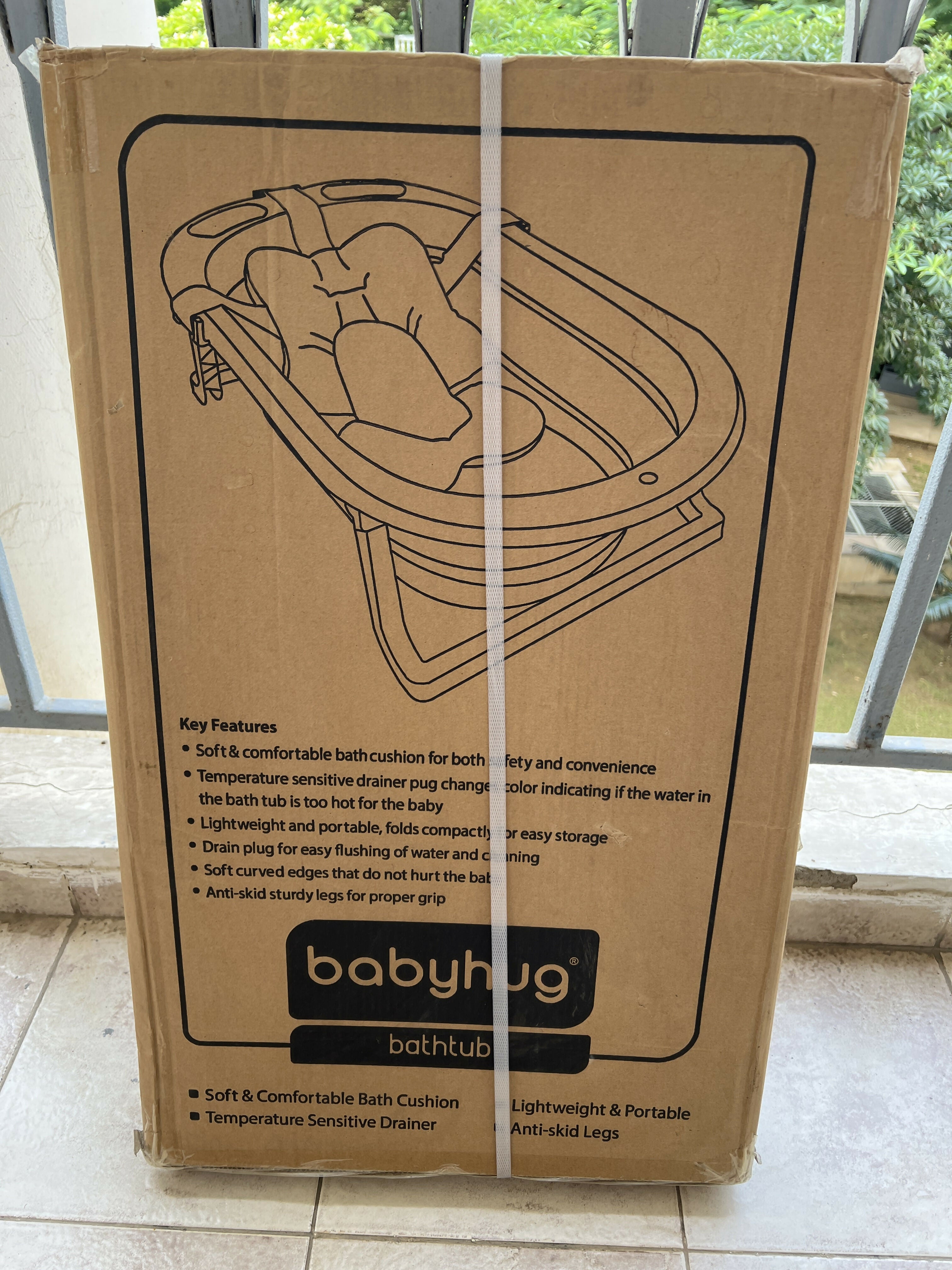 Babyhug Foldable Baby Bathtub with Soft Bath Cushion featuring a space-saving foldable design and comfortable cushioned support for convenient supervised bathing at home or while travelling.