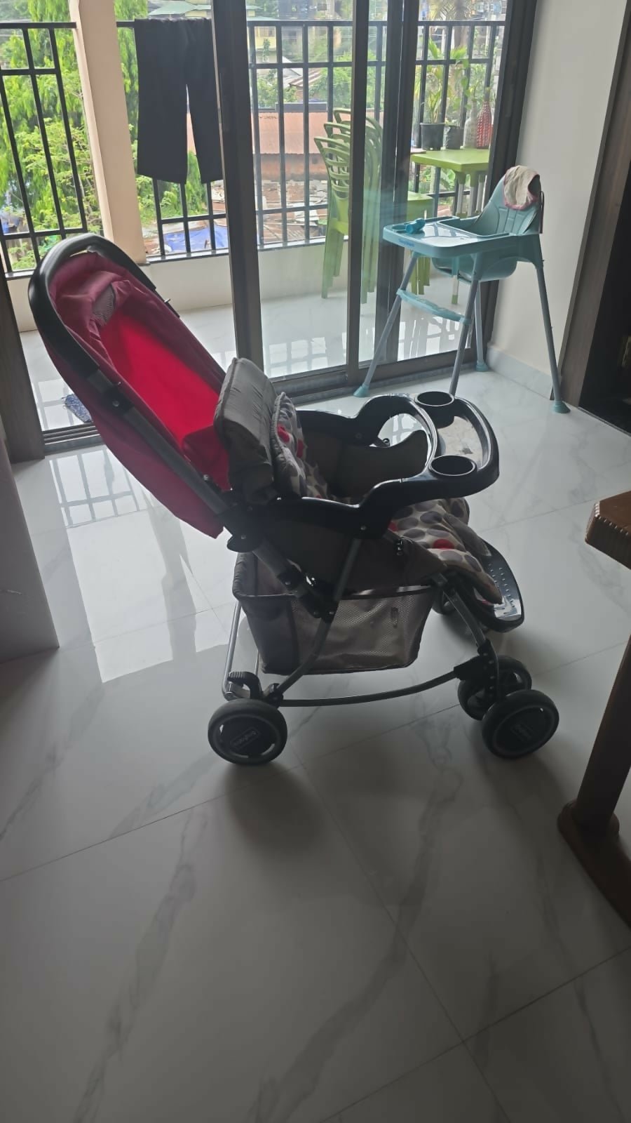 BABYHUG 2 in 1 Rock and Roll stroller cum rocker with reclining seat, sturdy wheels, safety harness, canopy, and dual stroller-to-rocker design for baby comfort and travel.