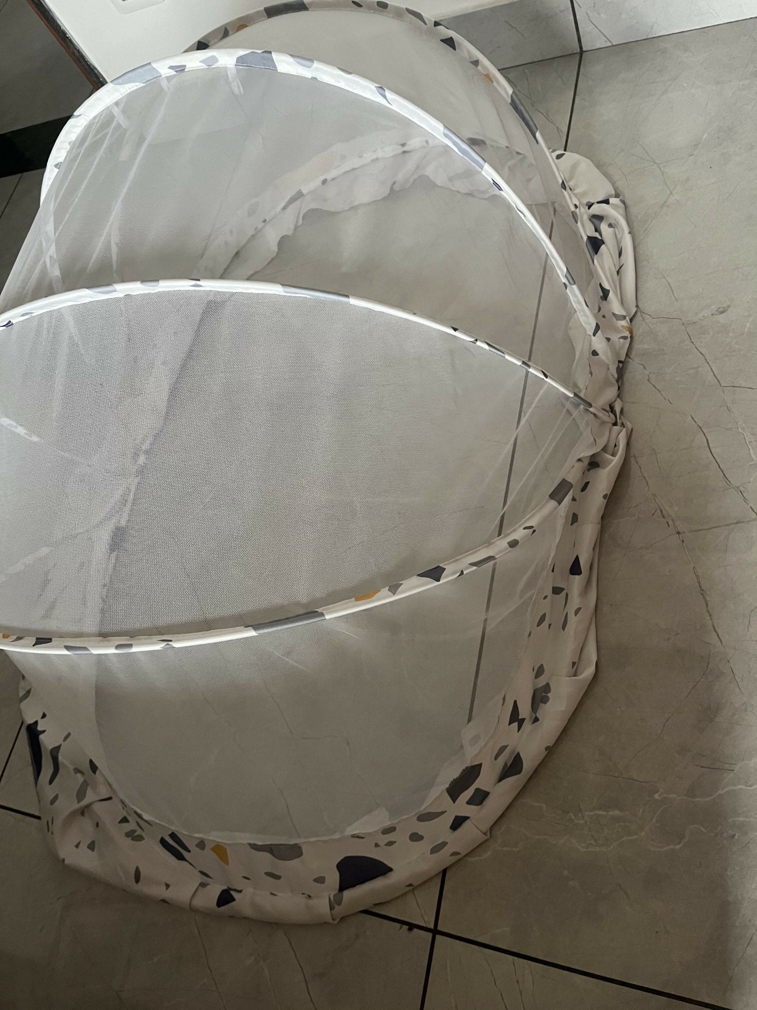 Large mosquito net made from fine breathable mesh with full-coverage protection, lightweight construction, and easy installation for cribs, beds, cots, or sleeping areas.