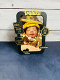 Baby photo album with newborn baby