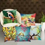 Set of colorful pillows with bird designs.