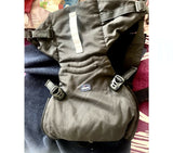 Chicco baby carrier with ergonomic design, padded shoulder straps, adjustable waist support, secure buckles, and multiple carrying positions for comfortable babywearing.