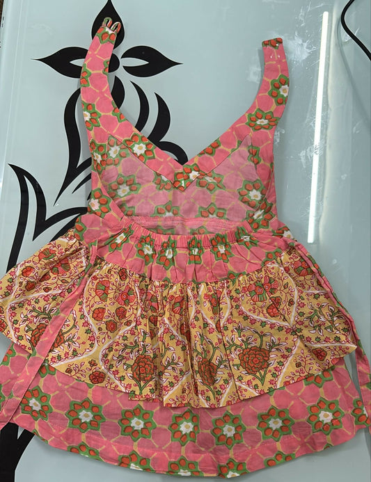 Floral patterned dress on a light blue background