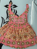 Floral patterned dress on a light blue background