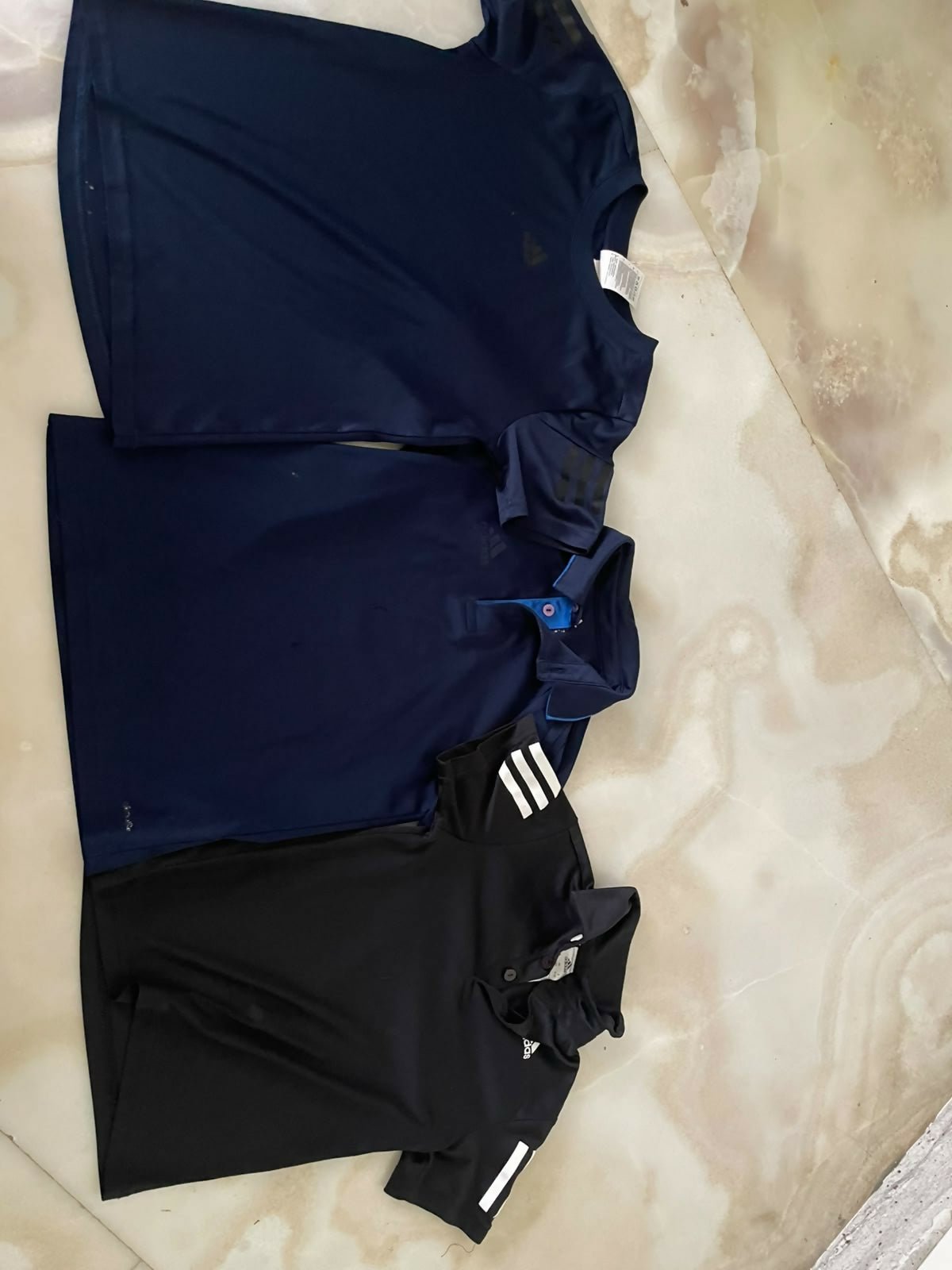 ADIDAS ORIGINALS T-shirts featuring soft comfortable fabric, classic fit, iconic logo design, and versatile styling for everyday wear, sports, and casual outings.