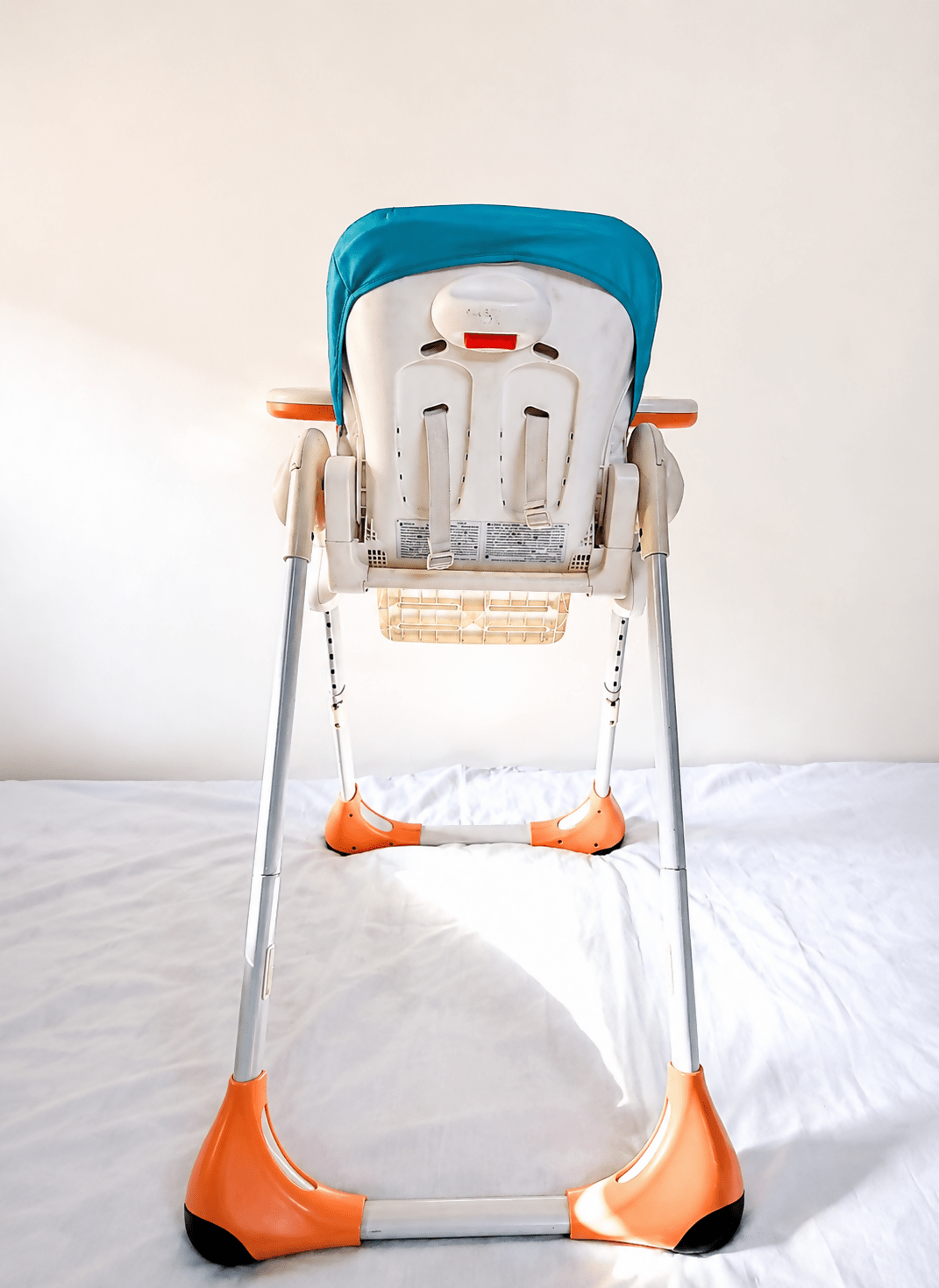 Chicco Polly foldable baby high chair with reclining feeding seat, adjustable tray, cushioned seating, sturdy frame, and premium design for comfortable baby mealtime and feeding.