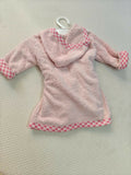 Pink children's robe with checkered trim on a hanger against a light background