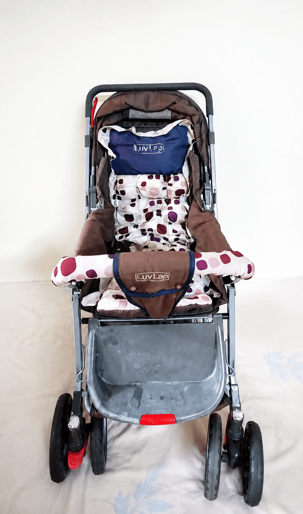 LUVLAP Sunshine reversible handle stroller with reclining seat, foldable baby pram design, safety harness, adjustable canopy, and comfortable travel support for babies and toddlers.