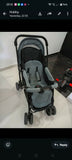 Babyhug Symphony stroller with reclining seat, smooth wheels, safety harness, adjustable canopy, and comfortable travel design for babies and toddlers.