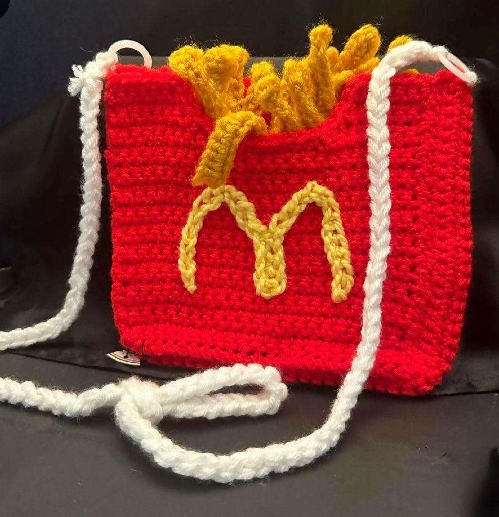 Handmade crochet bag for girls crafted from soft, durable yarn with a stylish design, comfortable strap, and lightweight construction for everyday use, outings, and special occasions.