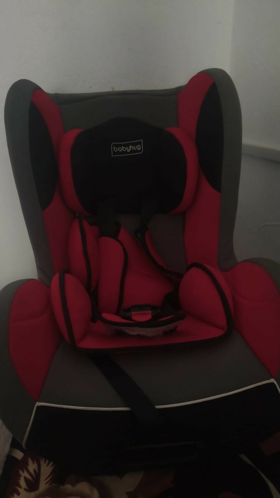 BABYHUG Cruise convertible car seat with rear and forward-facing modes, adjustable safety harness, cushioned seating, side-impact protection, and comfortable support for growing children.