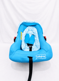 BABYHUG infant car seat carry cot with canopy, rear-facing design, cushioned seating, 5-point safety harness, ergonomic carry handle, and sun-protective canopy for newborns and infants up to 13 kg.