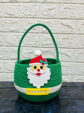 Green basket with Santa Claus face design