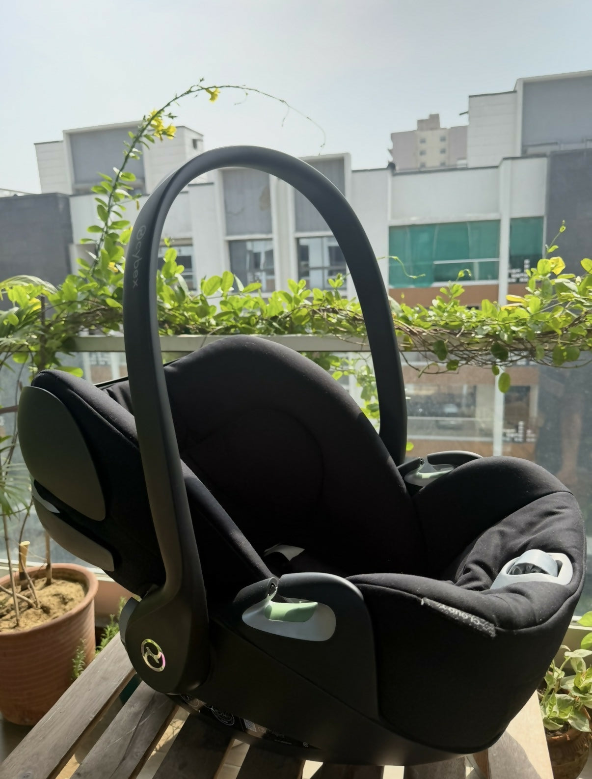 Cybex Cloud T Infant Car Seat with ergonomic reclining design, padded infant support, adjustable headrest, safety harness, side-impact protection, and comfortable seating for secure newborn and infant travel.