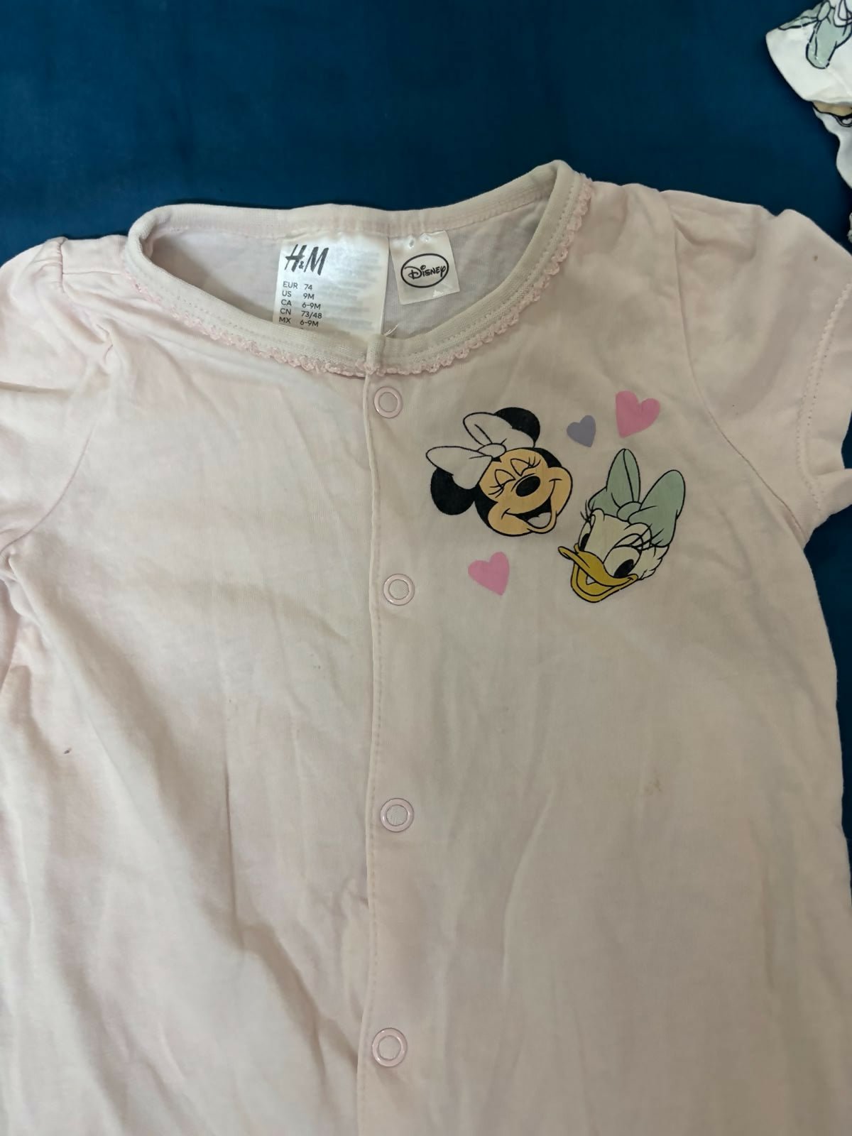 H&M Disney Collection 2-pack cotton rompers featuring soft breathable fabric, comfortable fit, easy wear design, and playful character-inspired prints for babies and toddlers.