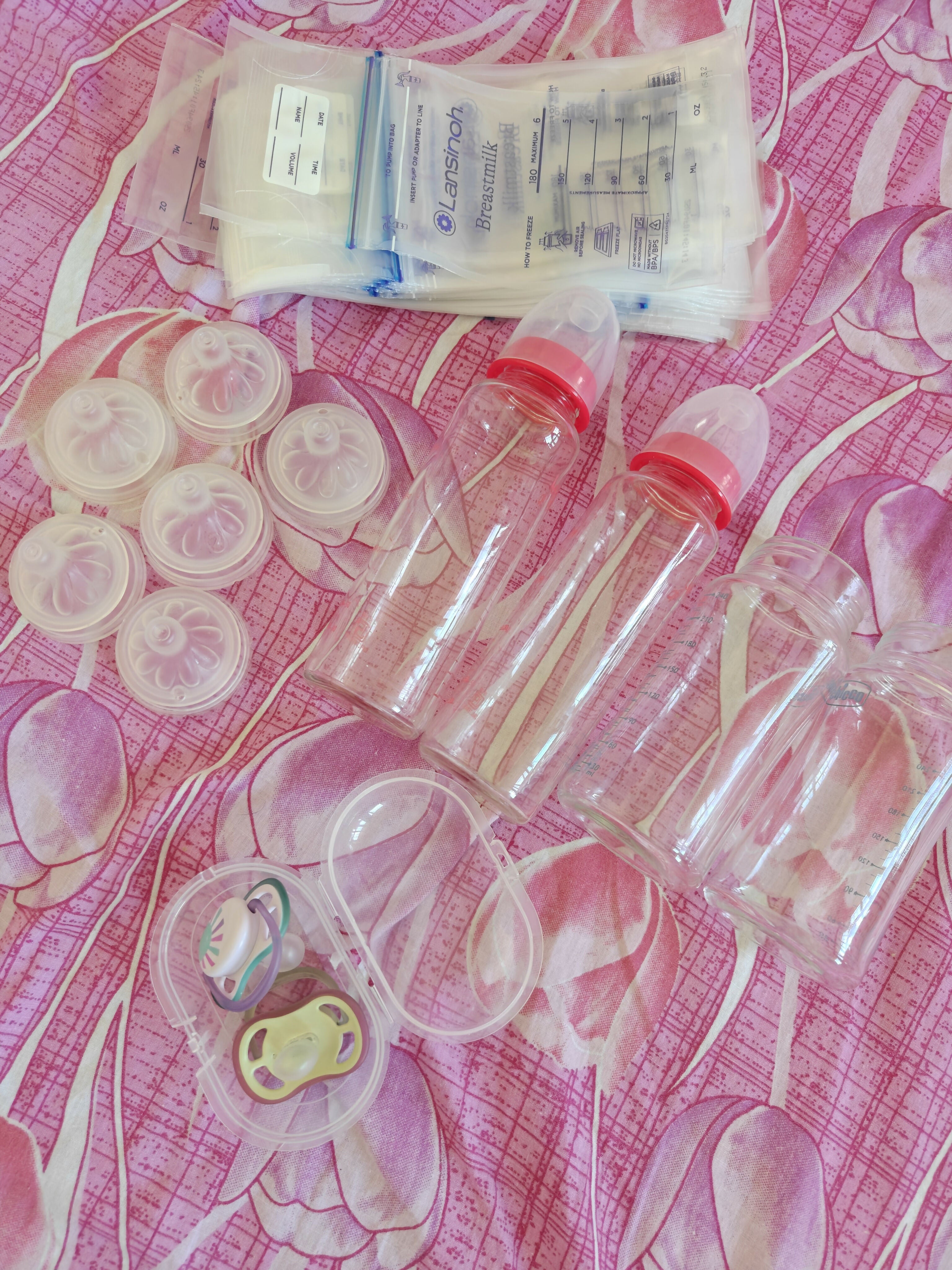 SPECTRA S2 Plus hospital-grade double electric breast pump with dual pumping system, adjustable suction settings, milk collection bottles, and comfortable breastfeeding support for nursing mothers.