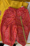 Red patterned fabric with a yellow background