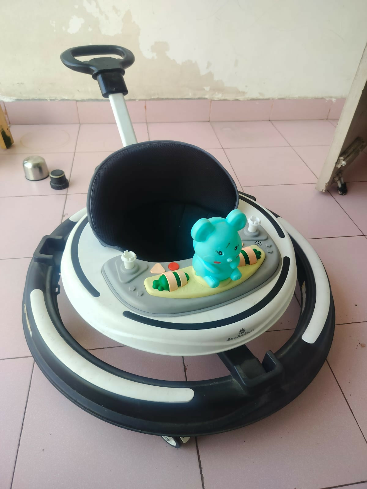 StarAndDaisy 3-in-1 baby walker with parent handle and musical tray, almost new condition