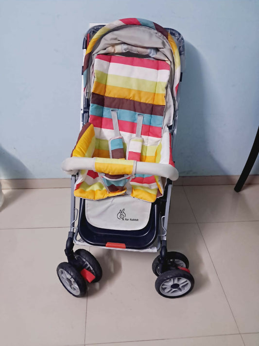 Experience comfort, safety, and style with the R FOR RABBIT Stroller/Pram, featuring adjustable recline positions, swivel wheels, and ample storage for hassle-free outings.