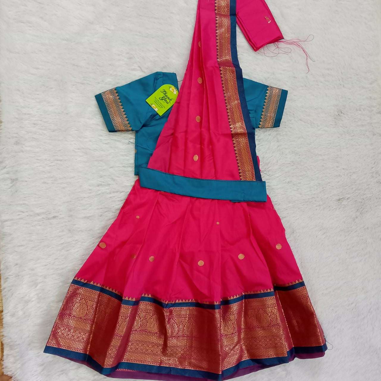 Discover our Half Saree for Baby Girls, crafted with delicate fabrics and vibrant colors for a charming and unique look perfect for special occasions.