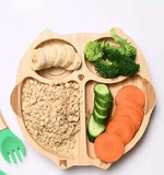 Bamboo plate with a strong silicone suction base, divided sections, smooth rounded edges, and eco-friendly food-grade construction for mess-free baby and toddler mealtimes.