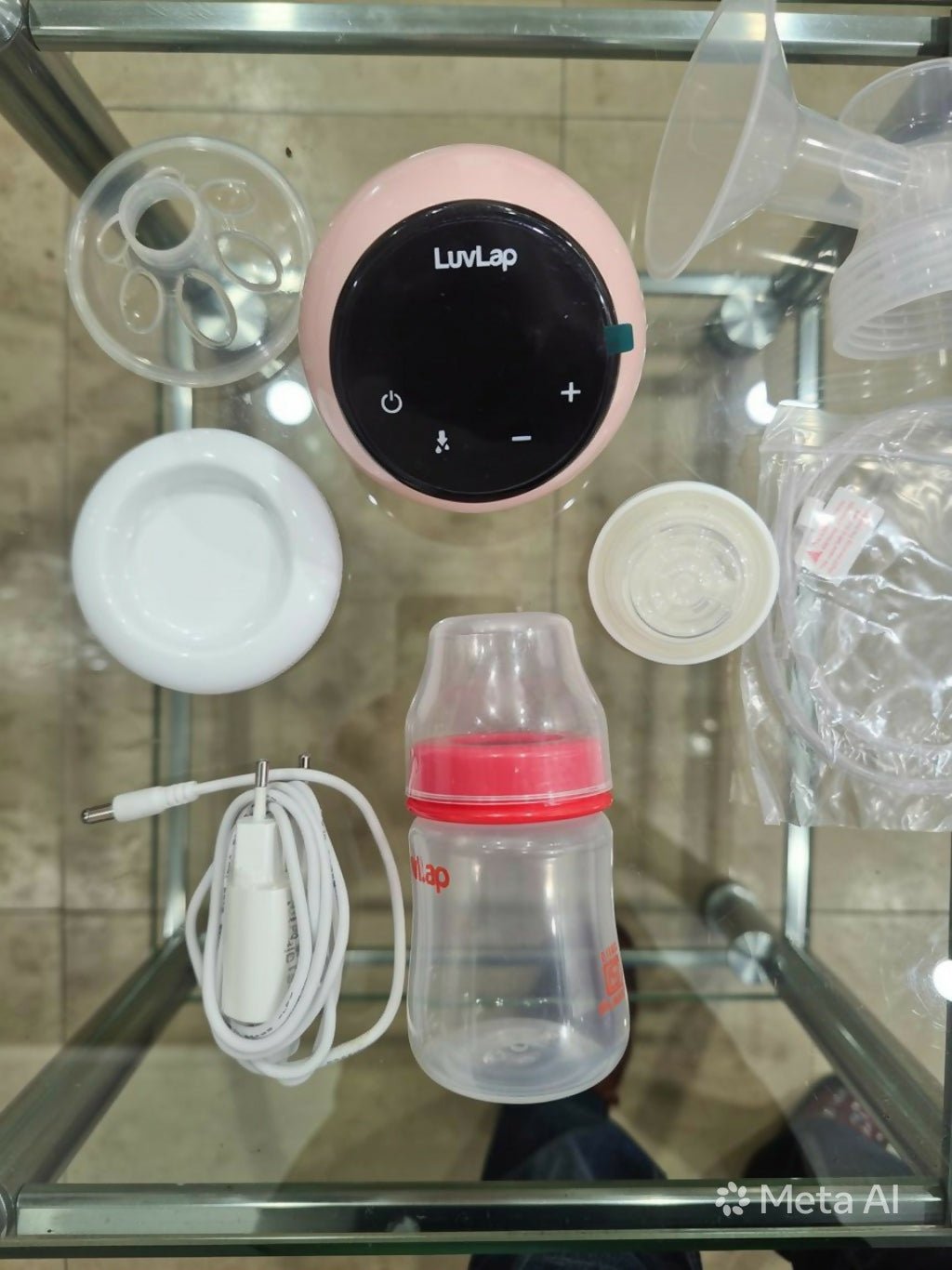 LuvLap Adore electric breast pump with adjustable suction settings, compact design, comfortable breast shield, and efficient milk collection support for breastfeeding mothers.